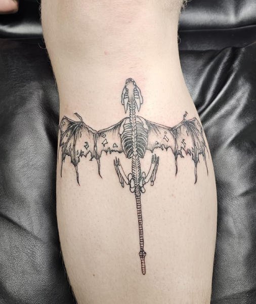 tattoo van een zombie draak